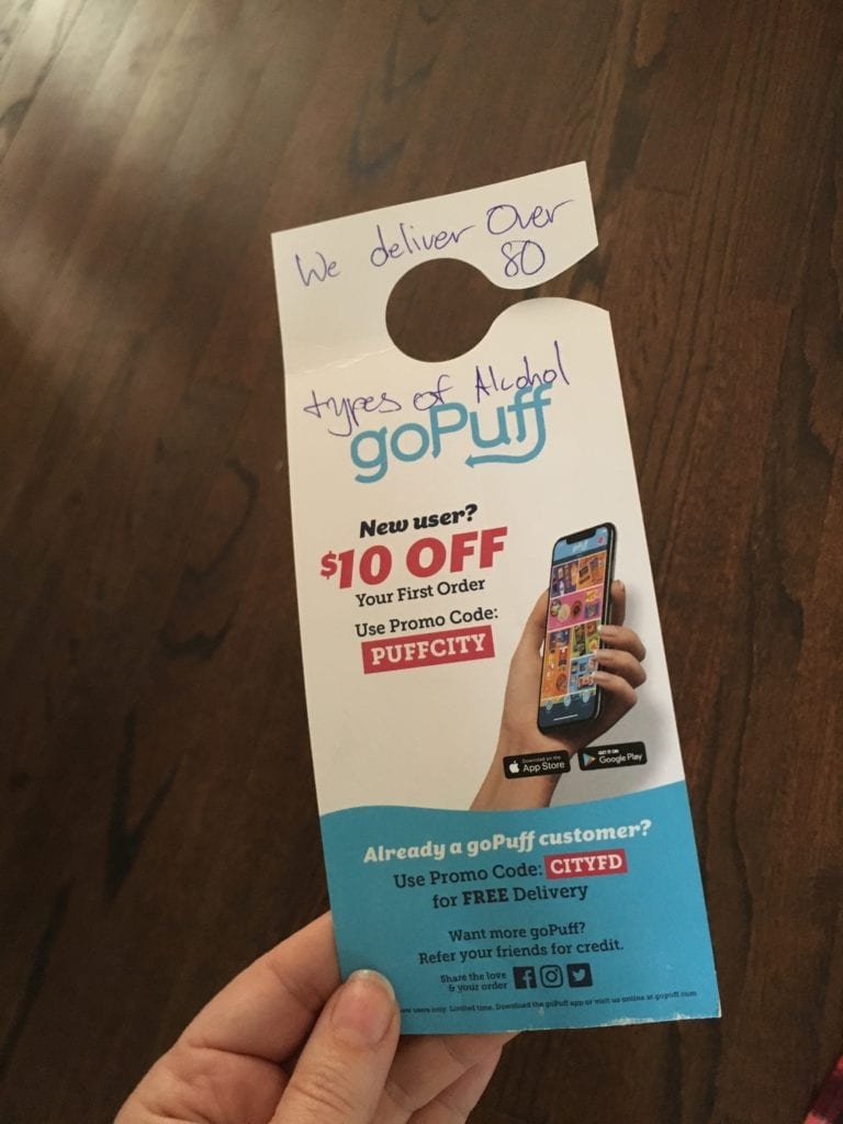 door hanger for goPuff delivery services offering alcohol delivery
