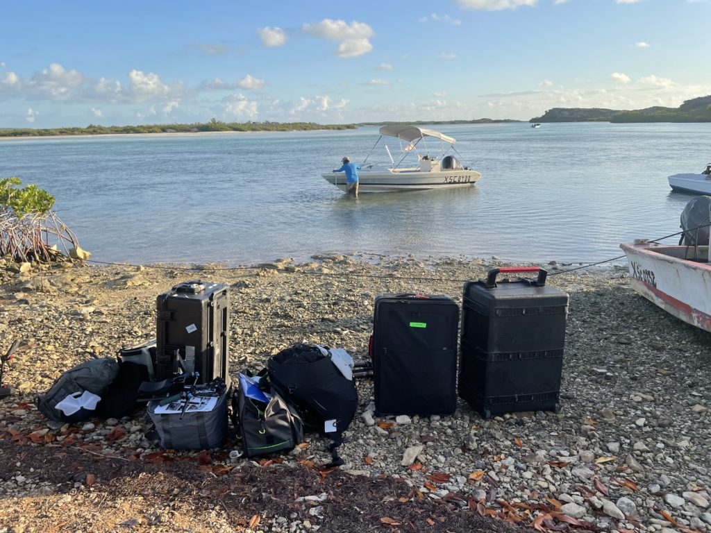 Many cases of luggage on shore in Turks and Caicos